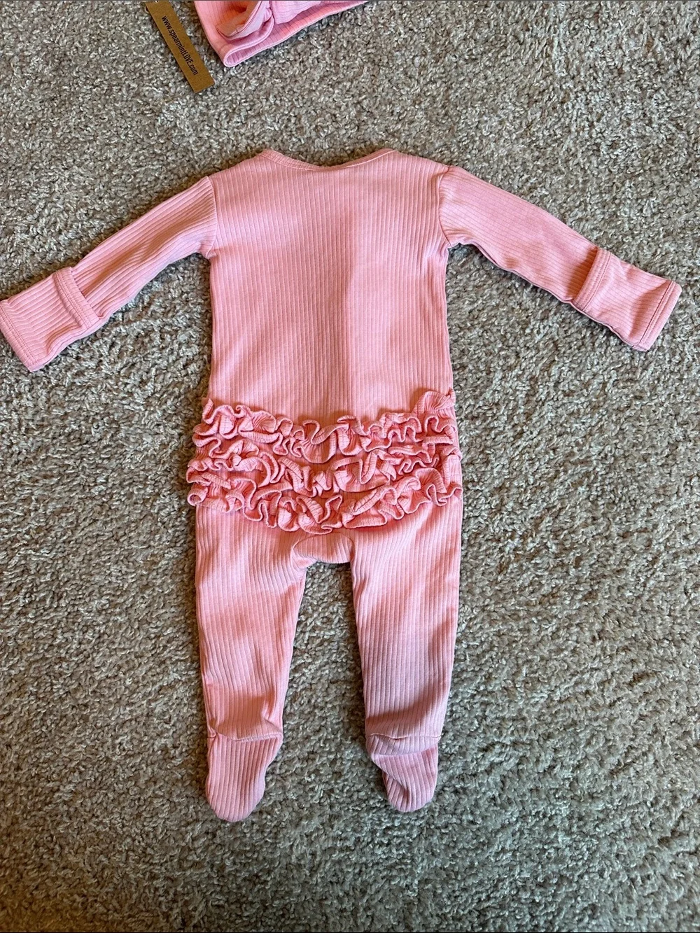 Pink organic ribbed frill zip footie with matching headband